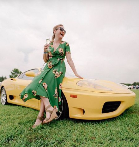 Jaymee Sire with her yellow colored car