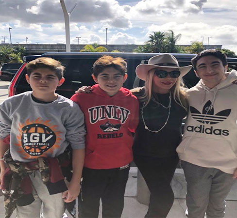 Adrienne Maoof along with her three kids 