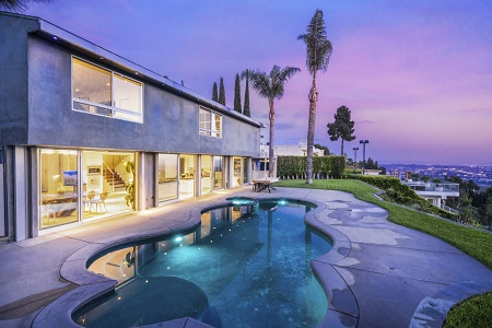 Nick's house has a swimming pool in it