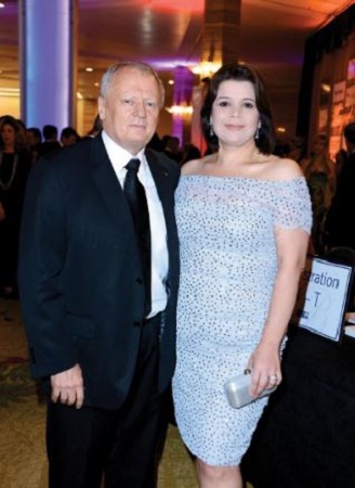 Ana Navarro with Gene Prescott attending the ceremony