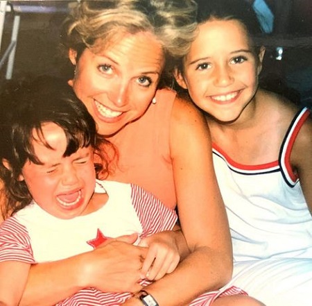 Katie with her two daughters.