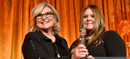 Cynthia McFadden giving The International Women's Media Foundation Award to Meridith Kohut