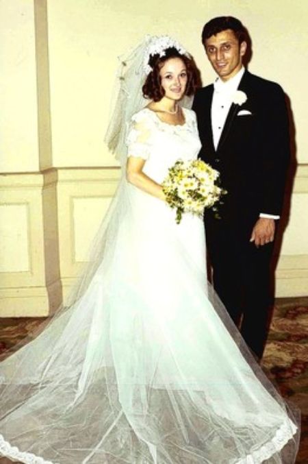 Carl and Mary posing together on their wedding