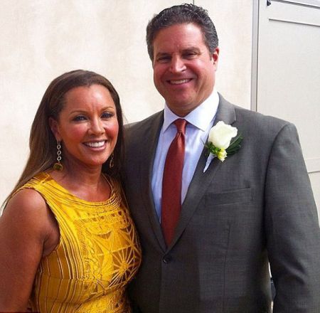 Vanessa is posing along with husband, Jim