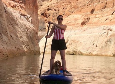 Lauren chilling with her dog