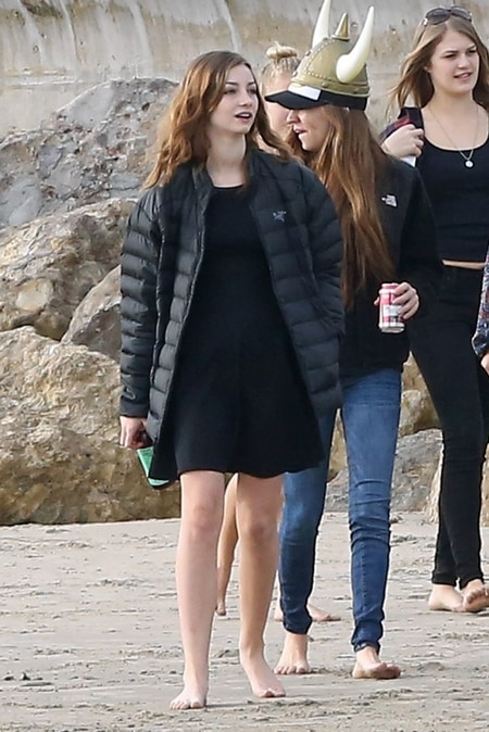 Meadow Rain Walker along with her friends on the beach