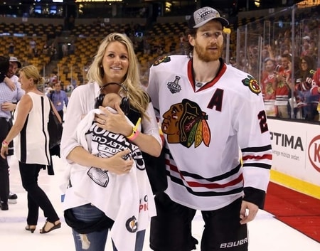 Duncan Keith and Kelly-Rae Keith with their son