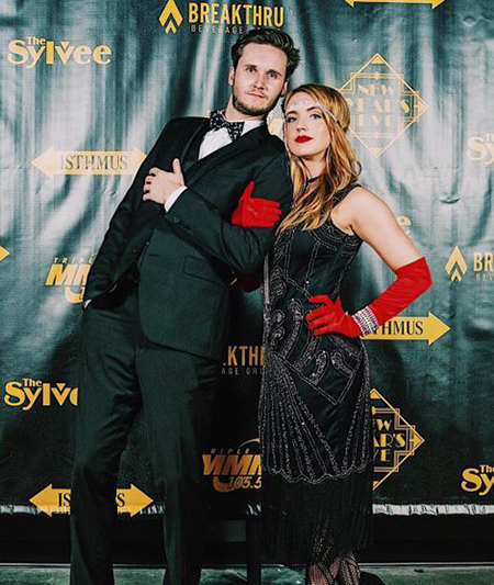 Morgan is holding her boyfriend's hand