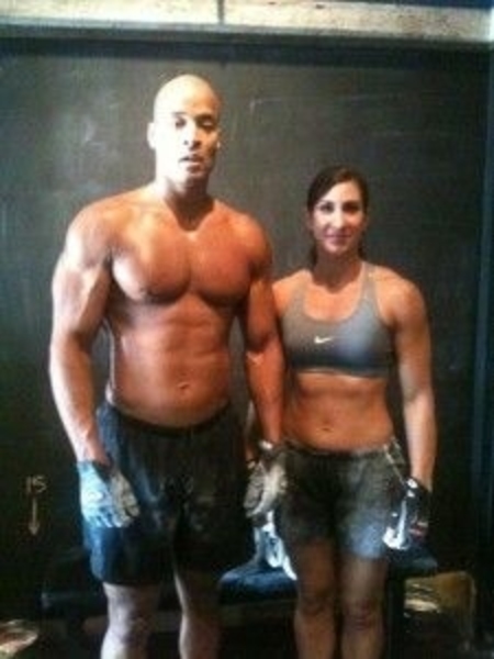 David Goggins and his partner Aleeza Goggins at the gym working out