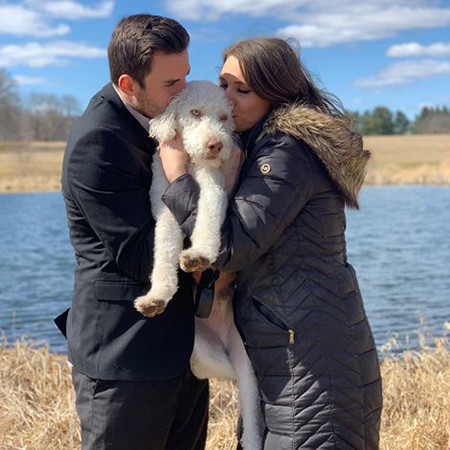 Matt and Sierra are having a great time with their dog, Dash