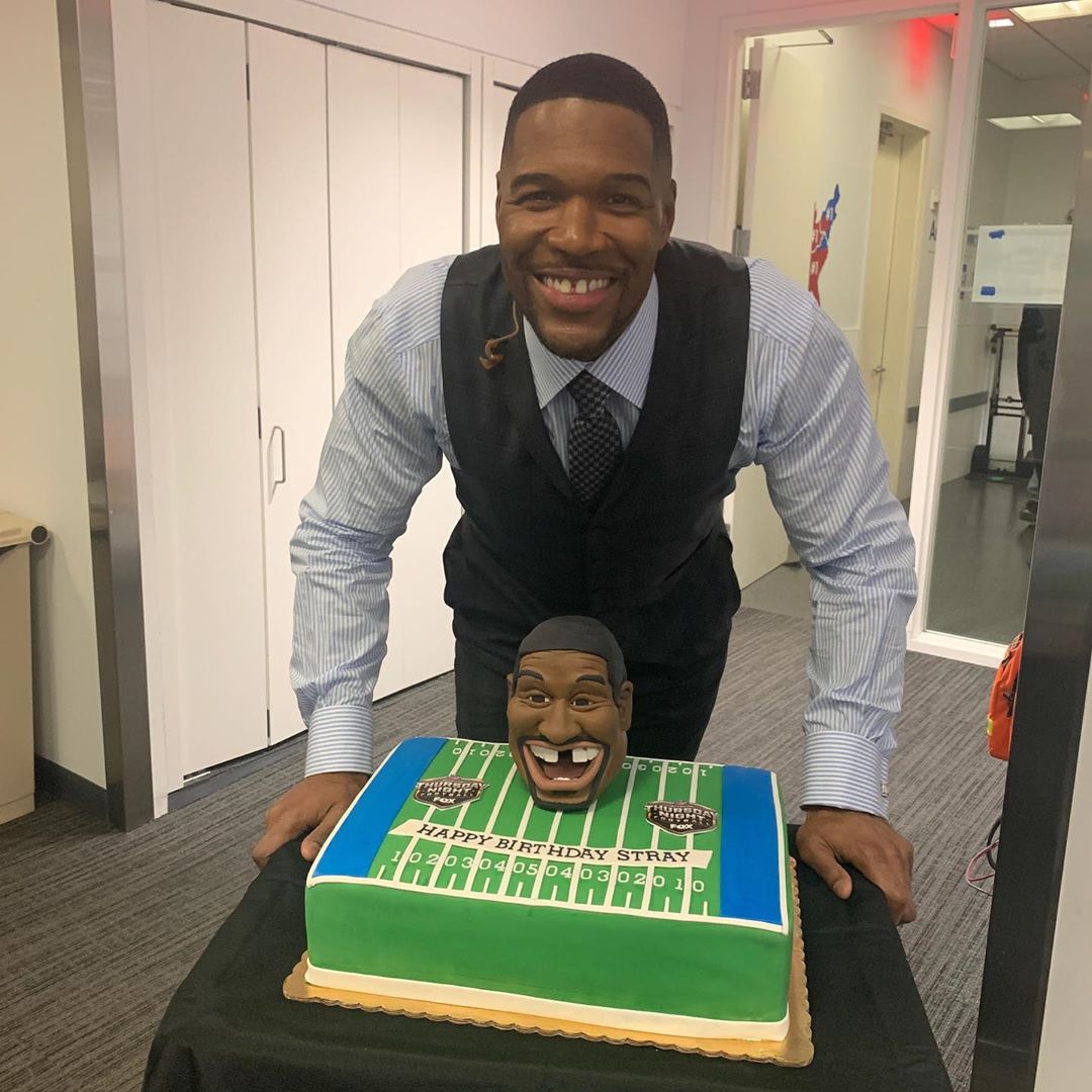 Michael smiling at camera