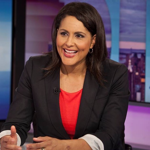 Karen's in black coat