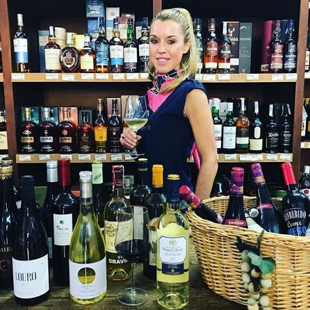 Julie Neville drinking wine