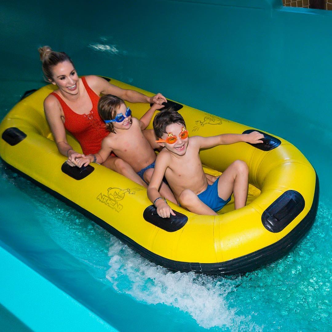 Candice enjoying with her children in water park