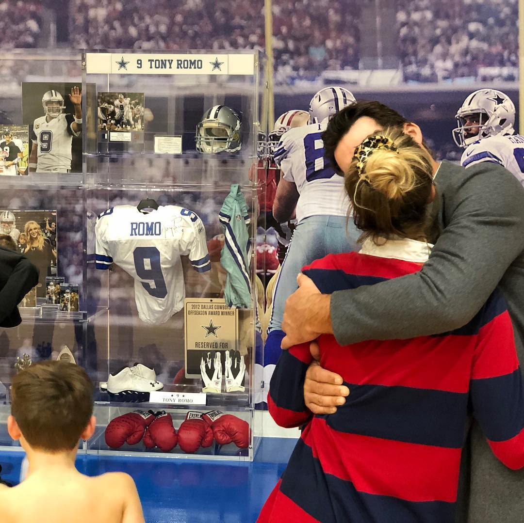 Candice and her husband kissing