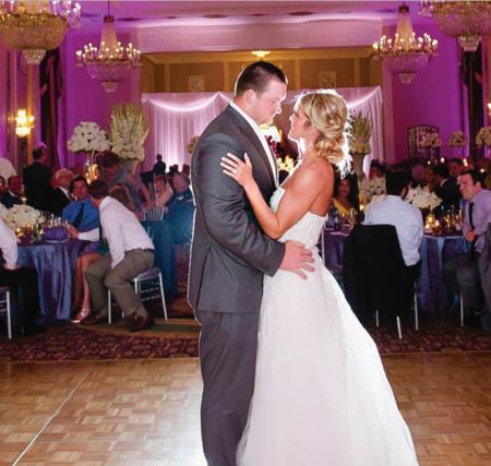 Bryan Bulaga and Abbie Mumpower dancing at their wedding