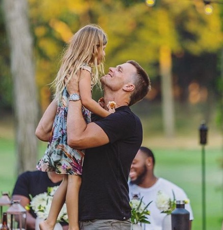 Tom with his daughter, Vivian Lake spending time together.