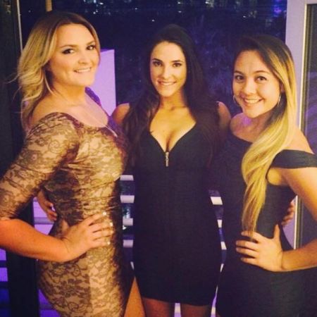 Kaitlyn Plum with her colleagues