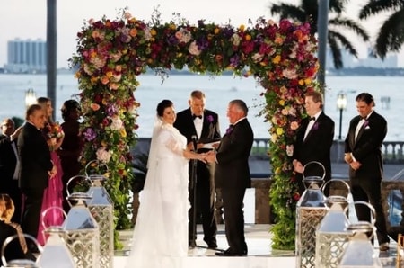Ana Navarro and Al Cardenas exchanging wedding vows with each other