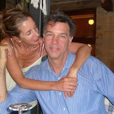 Martha hugging his husband, Mark