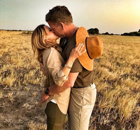 Catherine Mooty and Troy Aikman photo