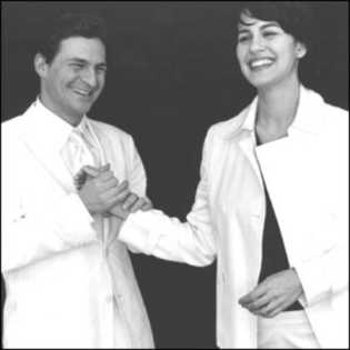Jenny Harris holding her husband David Faber's hand