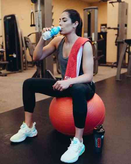 Kelsey Plum works hard, play hard