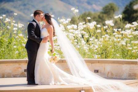 Lauren Plum's sister, Kaitlyn Plum and Matthew J. Lawrence kissing each other in their wedding day