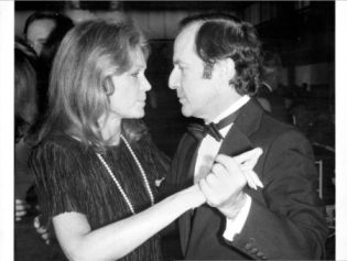Gloria Steinem dancing with Mort Zuckerman 