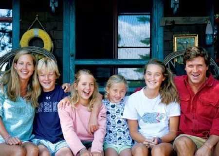 Susan Andrews and her husband with their children