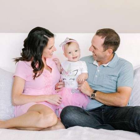 Angela Akins Garcia and her husband, Sergio Garcia with their daughter, Azalea Garcia