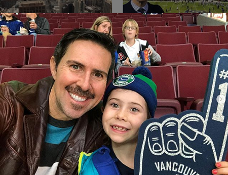 James with his wife and daughter