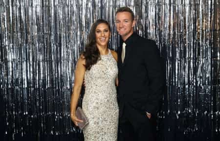 Carli Lloyd with her husband Brian Hollins at the program hosted by the FIFA