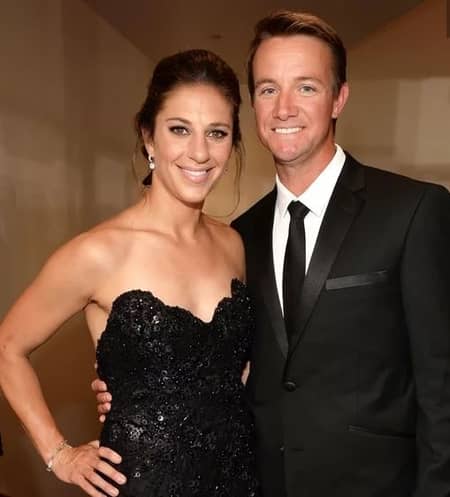 Brian Hollins with his wife Carli Lloyd