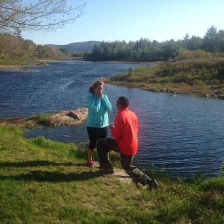 Oman Abdul Ali proposing Elle Duncan on the riverside of Atlanta