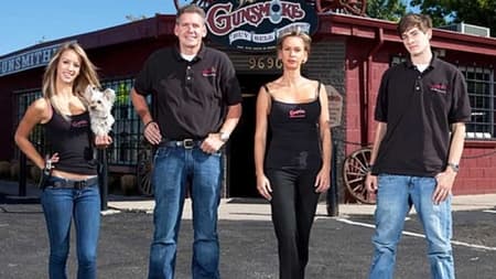 Paige Wyatt with her family from the show American Guns