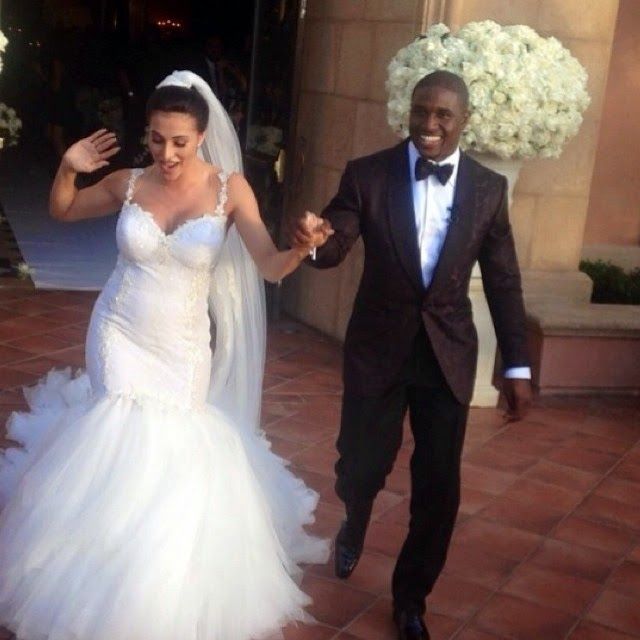 Lilit's and Reggie in their wedding dress