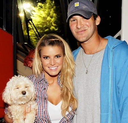 Tony Romo with Jessica Simpson and her dog
