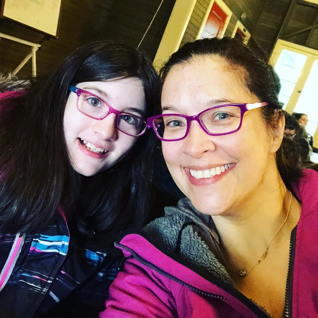 Jacque with her daughter taking selfie