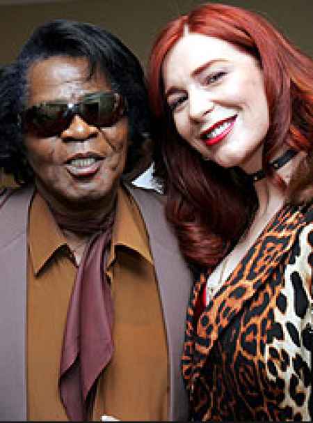 Tomi posing along with James