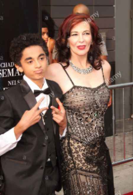 Tomi and son James at an event