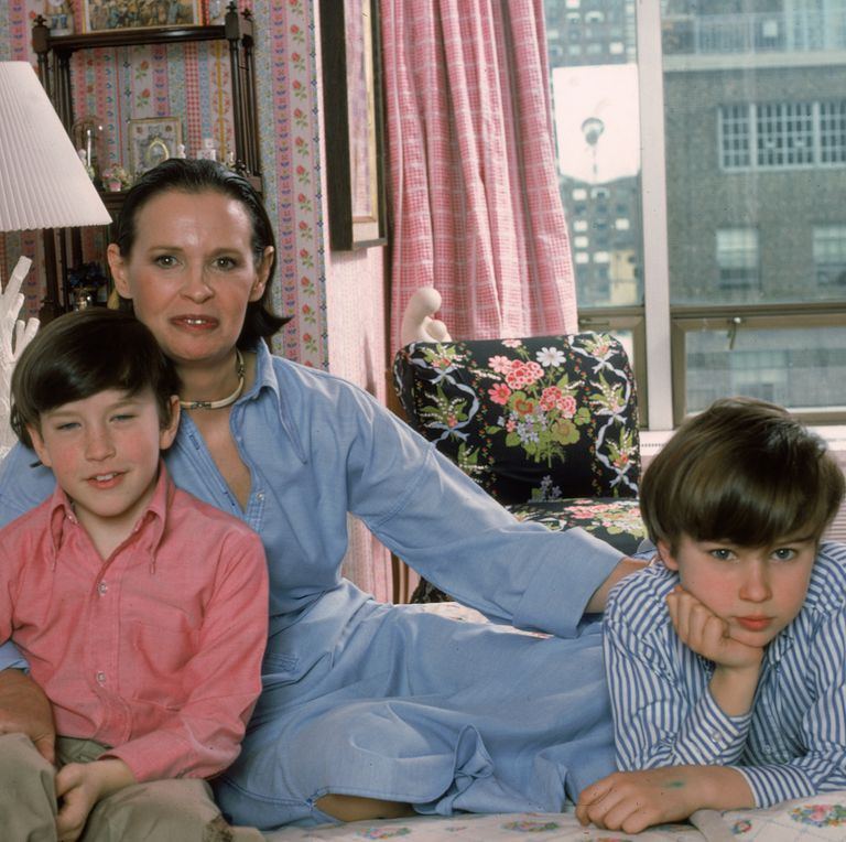 Swiss born socialite Gloria Vanderbilt poses with her two news photo