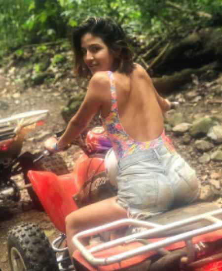 Erin driving her All-terrain vehicle