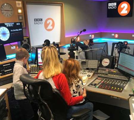 Fearne and her kids in her studio. know more about Fearne husband, podcast, wedding ceremony, marriage, spouse, net worth, children and many more