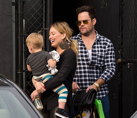 Luca Cruz Comrie with his parents