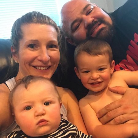 Brian and his wife with their sons