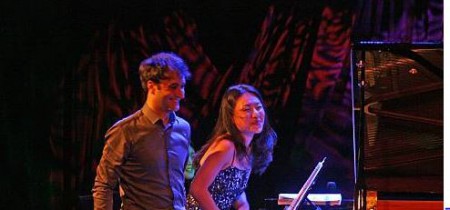 Soyeon Kate Lee and her husband, Ran performing a duet