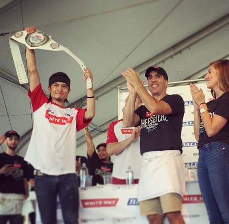 The youtuber with his winning belt.