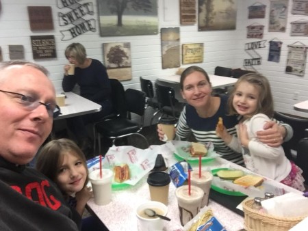 Maryna Ponomarenko is having dinner with her husband and kids.