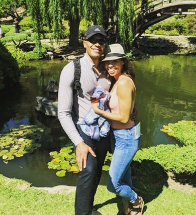 Ciera Payton with her partner on a summer holiday. The couple are hugging each other